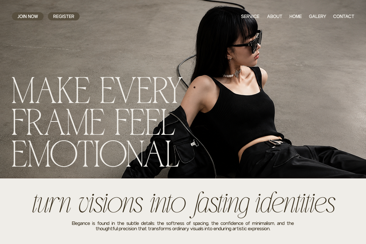 Woman in black tank top with sunglasses posing against concrete wall backdrop