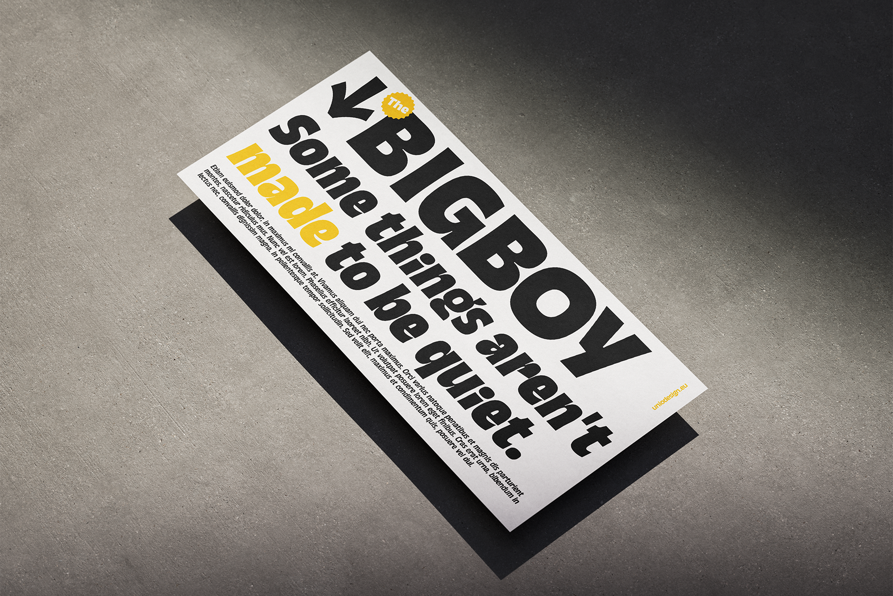 Tri-fold brochure mockup on concrete with bold black typography, yellow accent, sharp shadows
