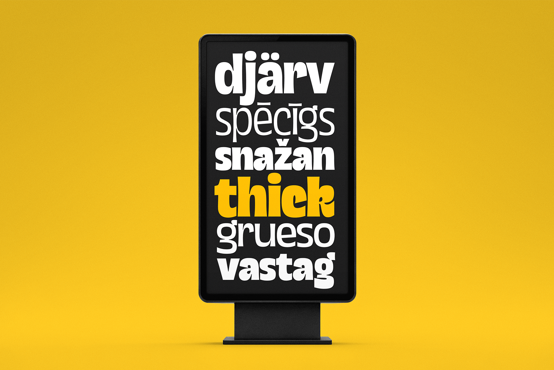 Vertical billboard mockup with black screen displaying multilingual words in white with yellow accent text on mustard background