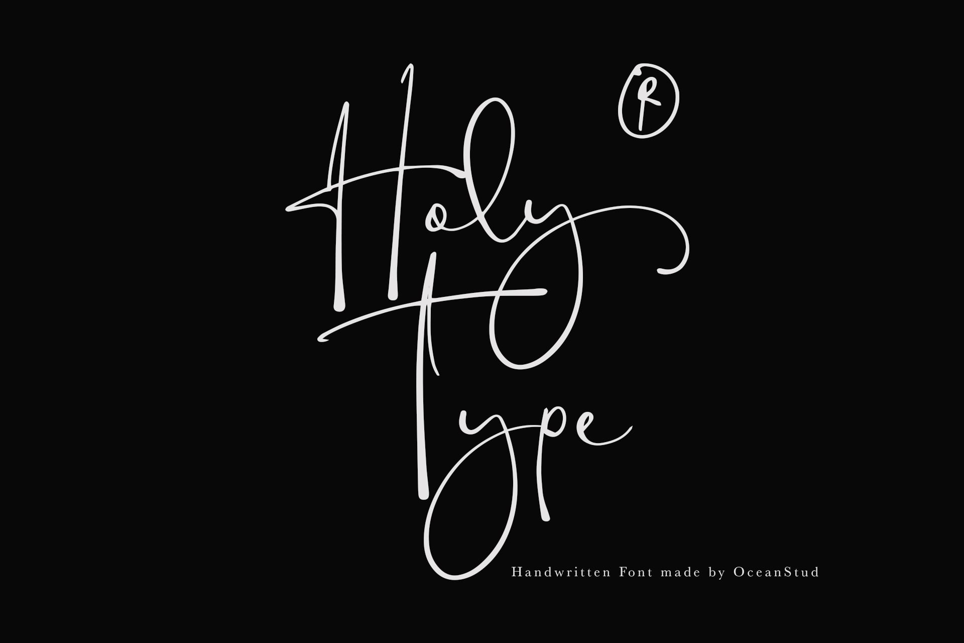 Handwritten script font with flowing cursive letters on black background