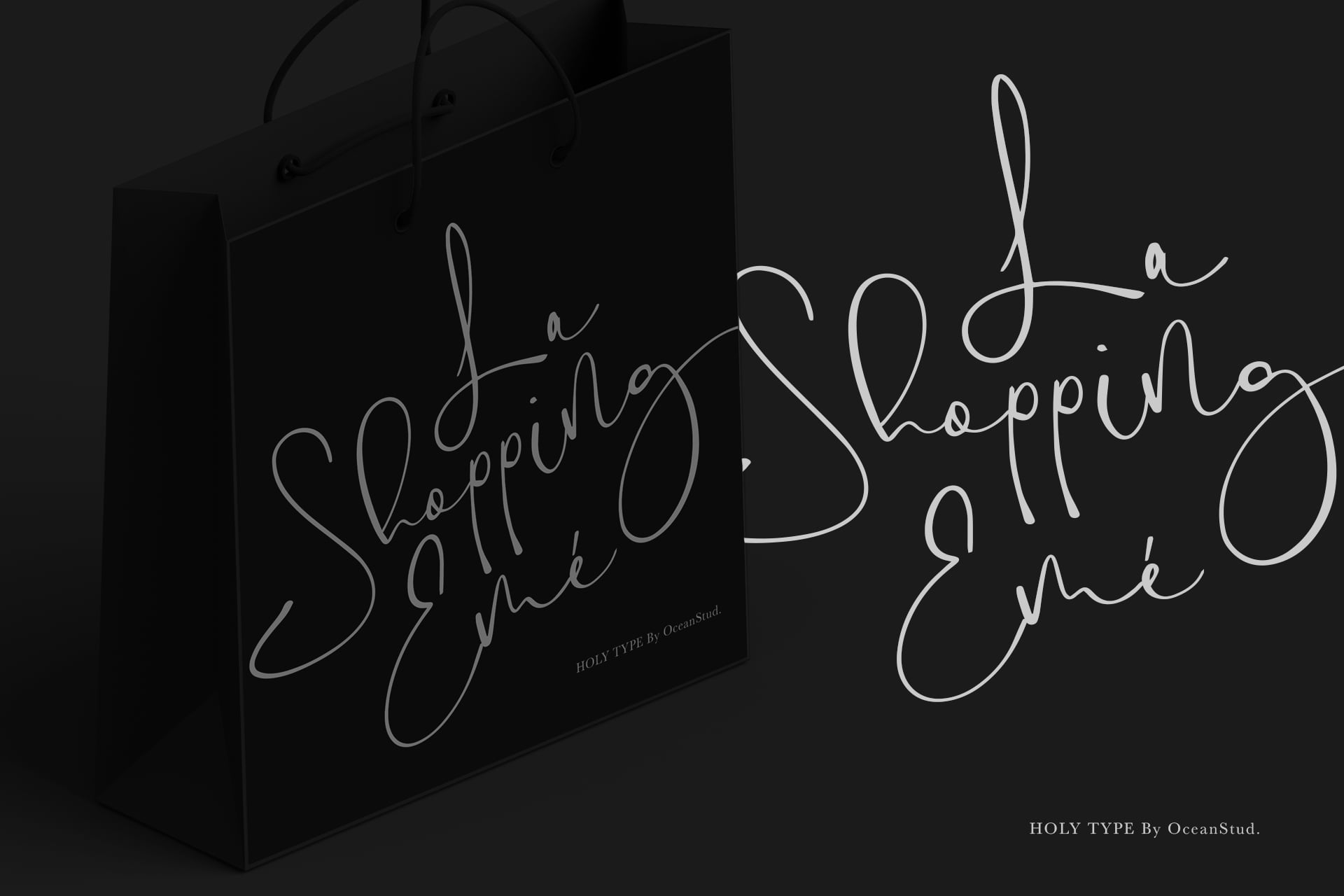 Shopping tote bag mockup with elegant script lettering on black fabric