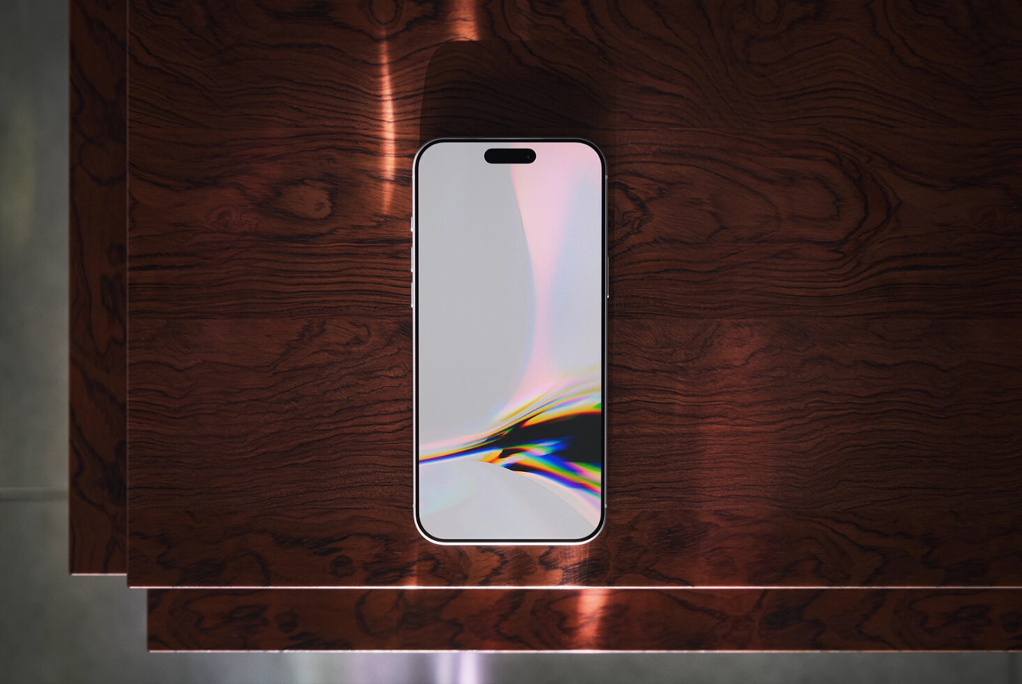 iPhone 14 Pro mockup on dark wood surface showing gradient prism wallpaper display