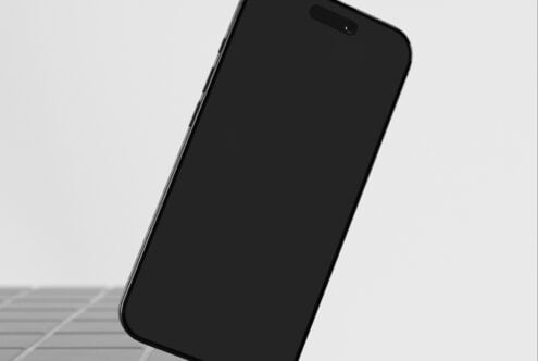 iPhone 14 Pro mockup tilted at angle on minimal background