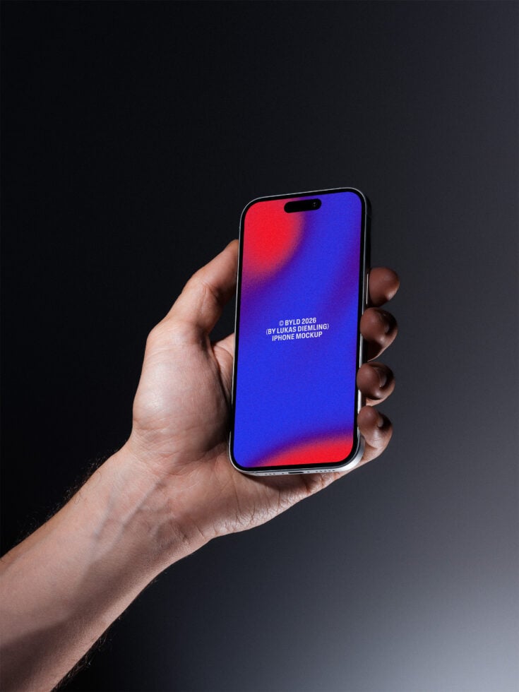 Hand holding iPhone with vibrant red to blue gradient screen on dark background