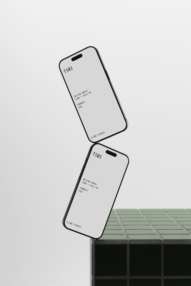 Two tilted iPhones with blank screens resting on geometric blocks, clean mockup setup