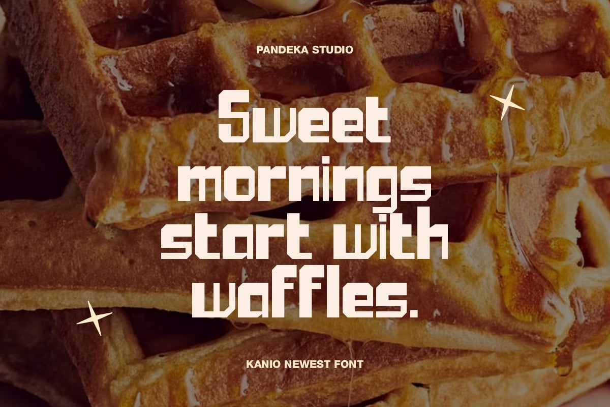Golden waffles with bold white text overlay reading "sweet mornings start with waffles"