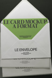 Stacked white envelopes with green card mockup showing text on dark background