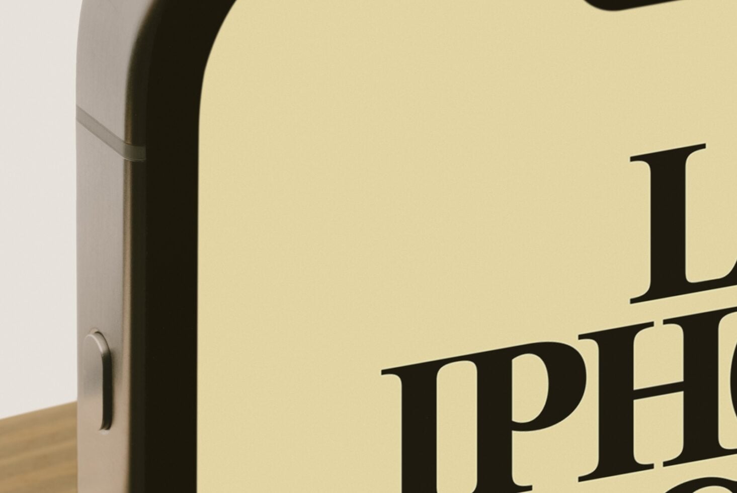 Cream box mockup with black serif typography on soft yellow background, angled view showing edge detail