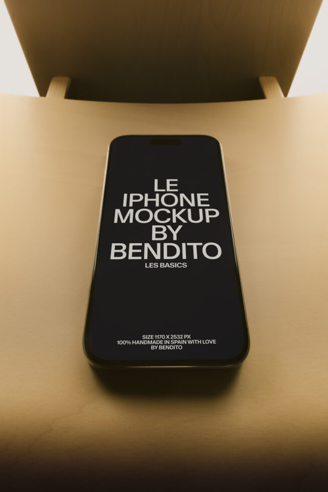 iPhone mockup on beige desk with olive chair overhead, screen displaying text layout