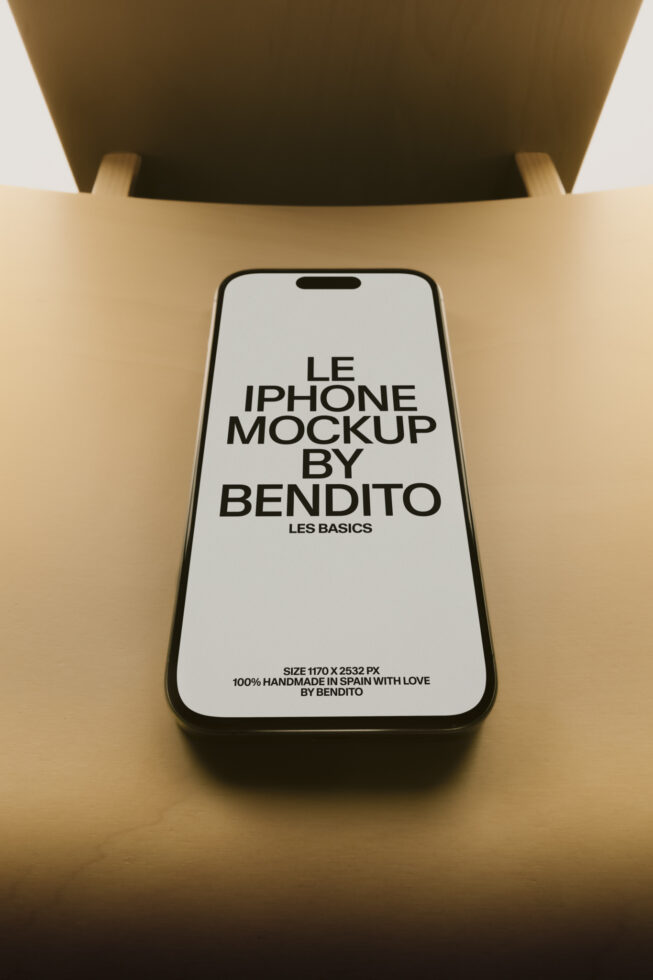 iPhone mockup overhead shot with warm tan background, black frame device on beige surface