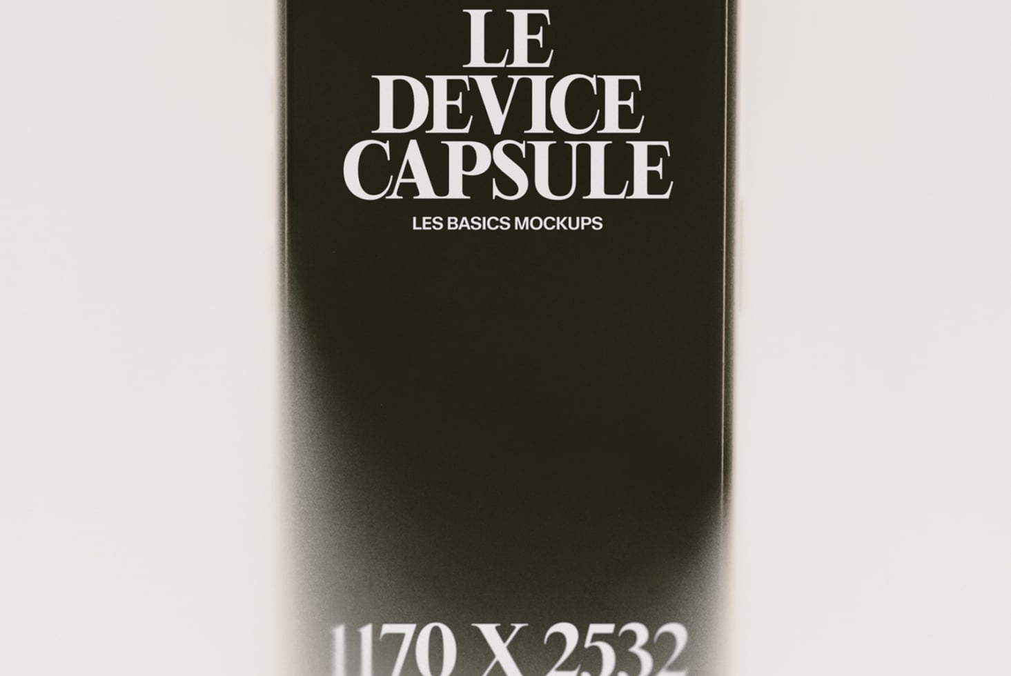 Sleek dark phone mockup with clean serif typography for Le Device Capsule