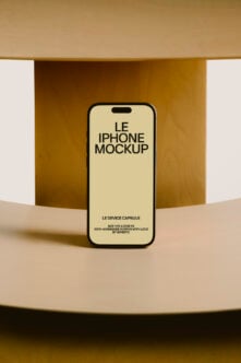 iPhone 14 Pro mockup on cream display with gold curved backdrop
