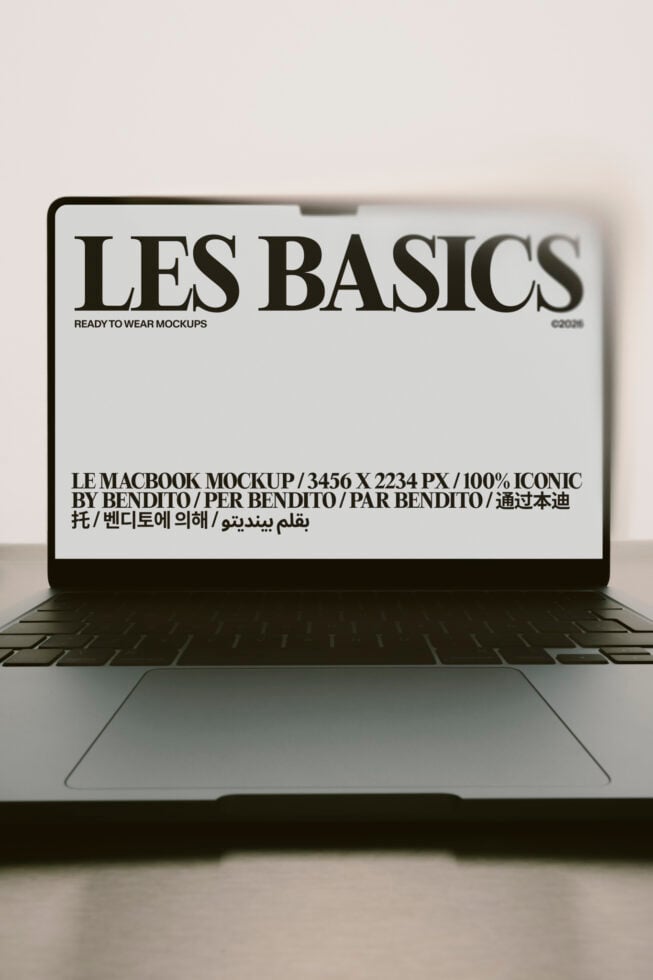 MacBook mockup showing Les Basics branding with multilingual text on screen
