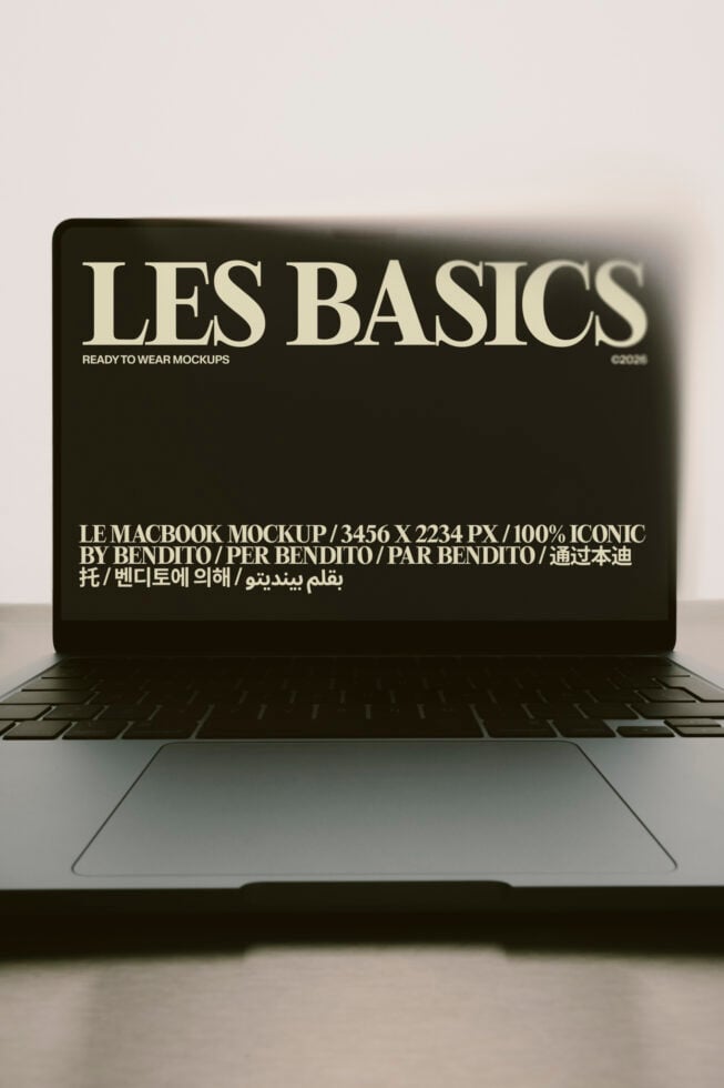 Les Basics MacBook mockup with cream serif type on dark screen by Bendito
