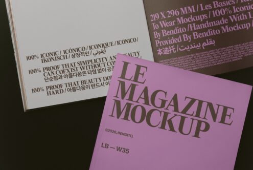 Le Magazine Mockup in mauve with multilingual text layouts displayed on dark surface