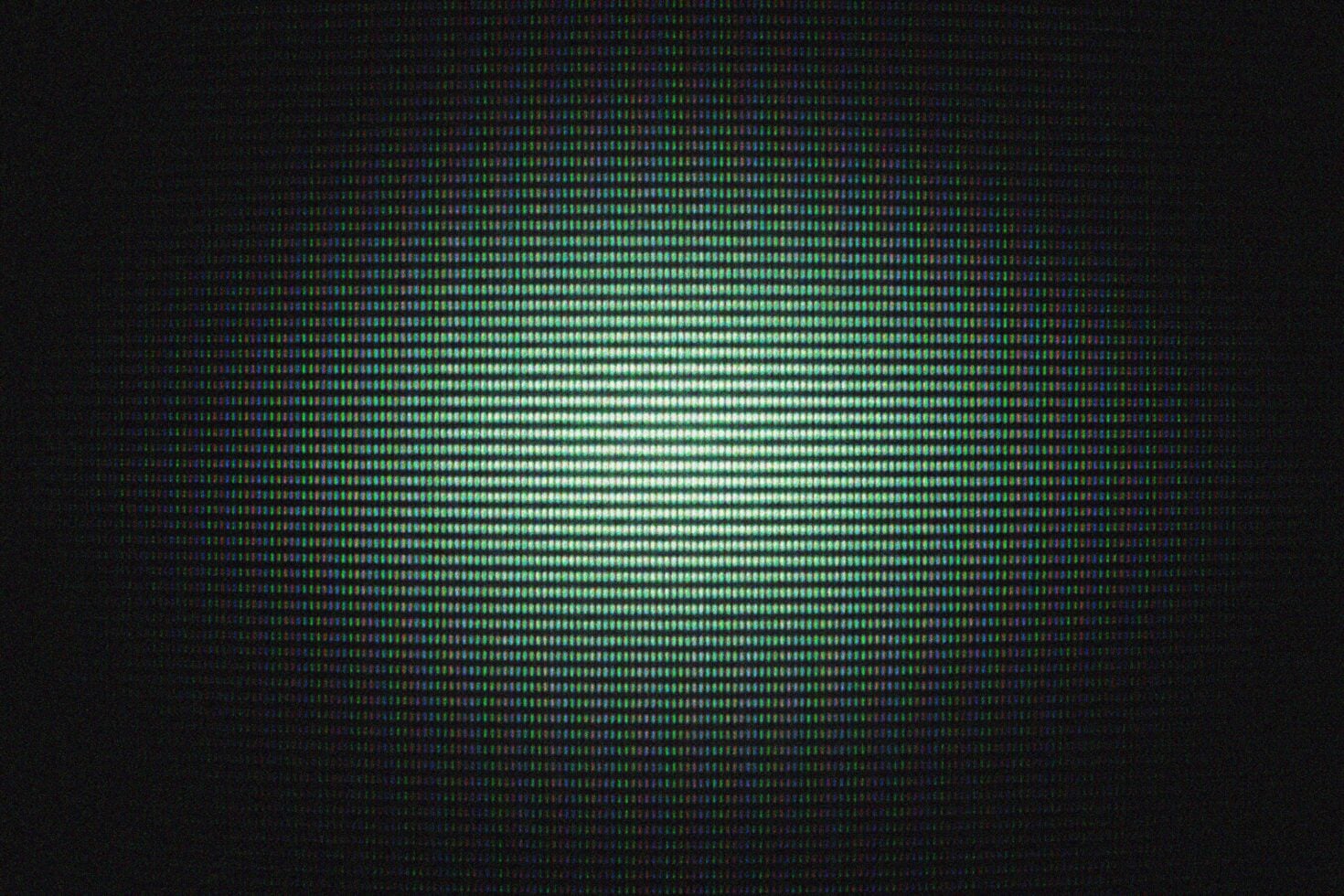 RGB pixel grid with glowing neon green, blue, yellow dots on dark background