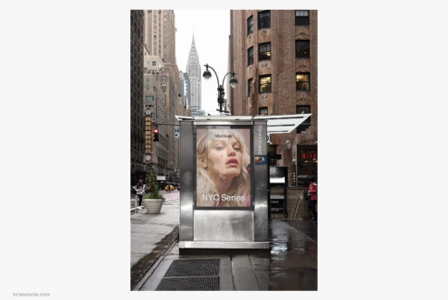 Street-level billboard mockup in Manhattan with Chrysler Building in background