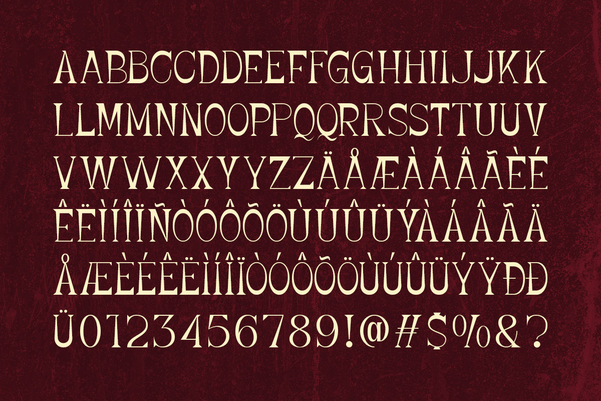 Serif font with international characters on deep burgundy textured background