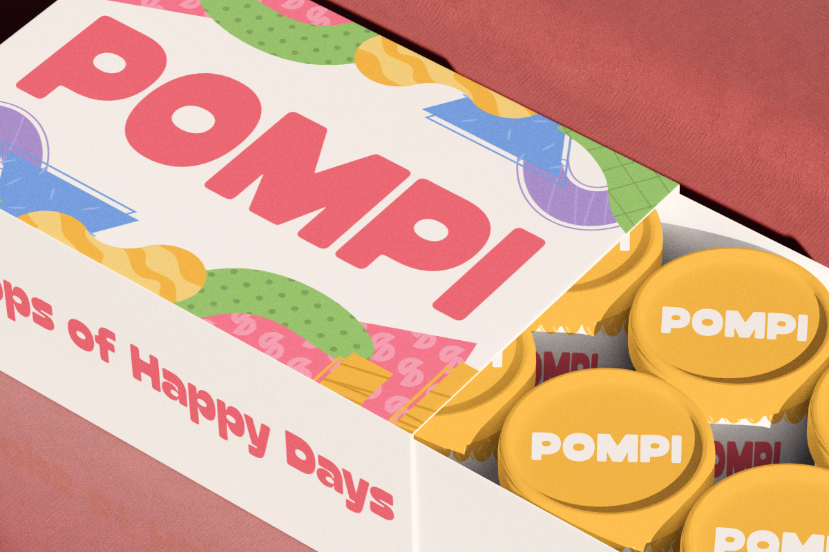 Colorful isometric box mockup with "Pompi" branding on gold stickers inside
