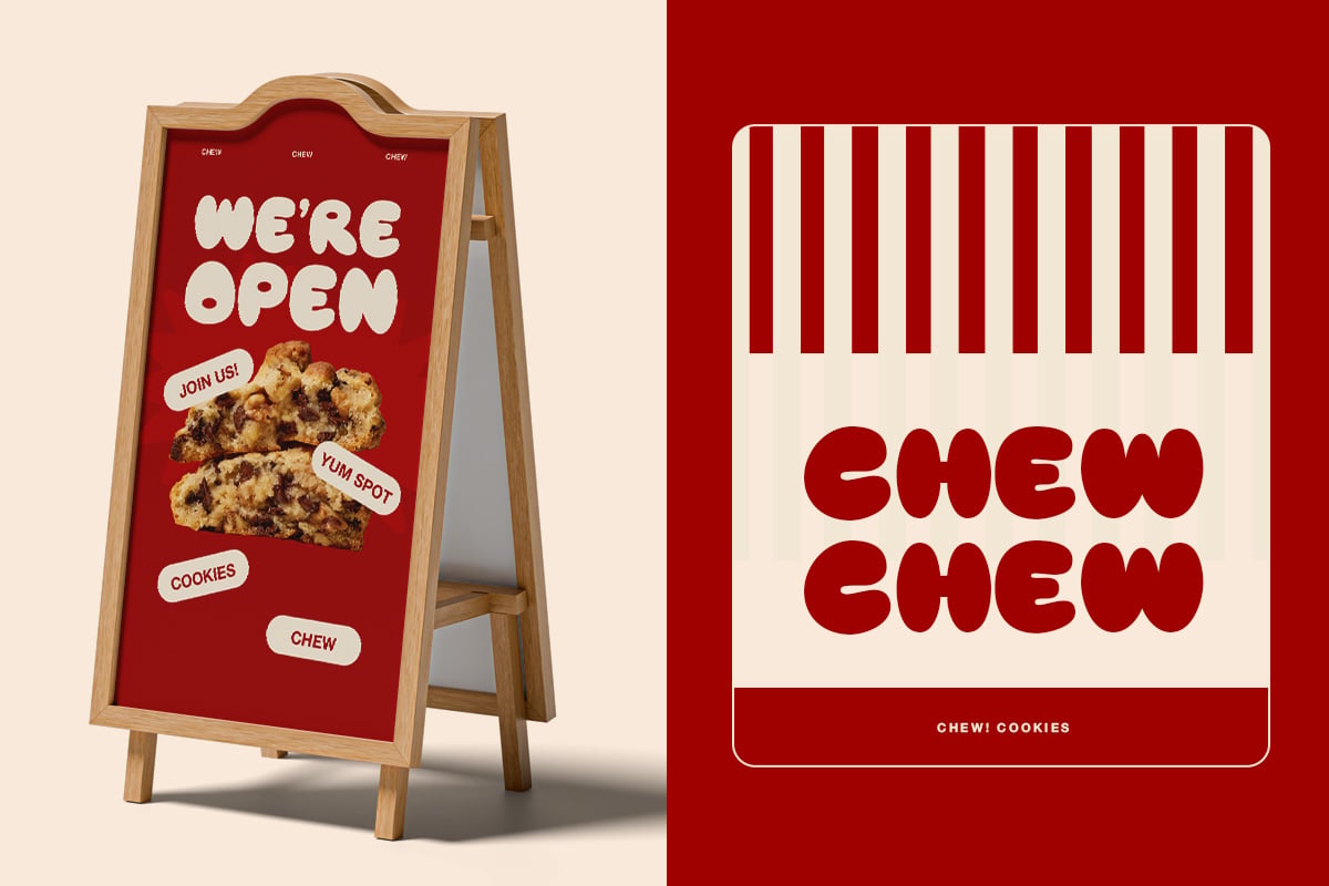 Wooden A-frame sandwich board sign for cookie shop with red background, cream text, cookie photo