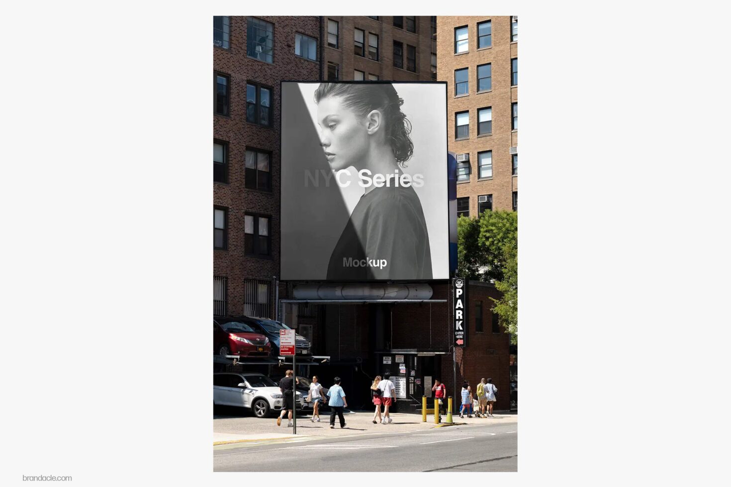 Outdoor billboard mockup showing portrait photography on urban brick building facade