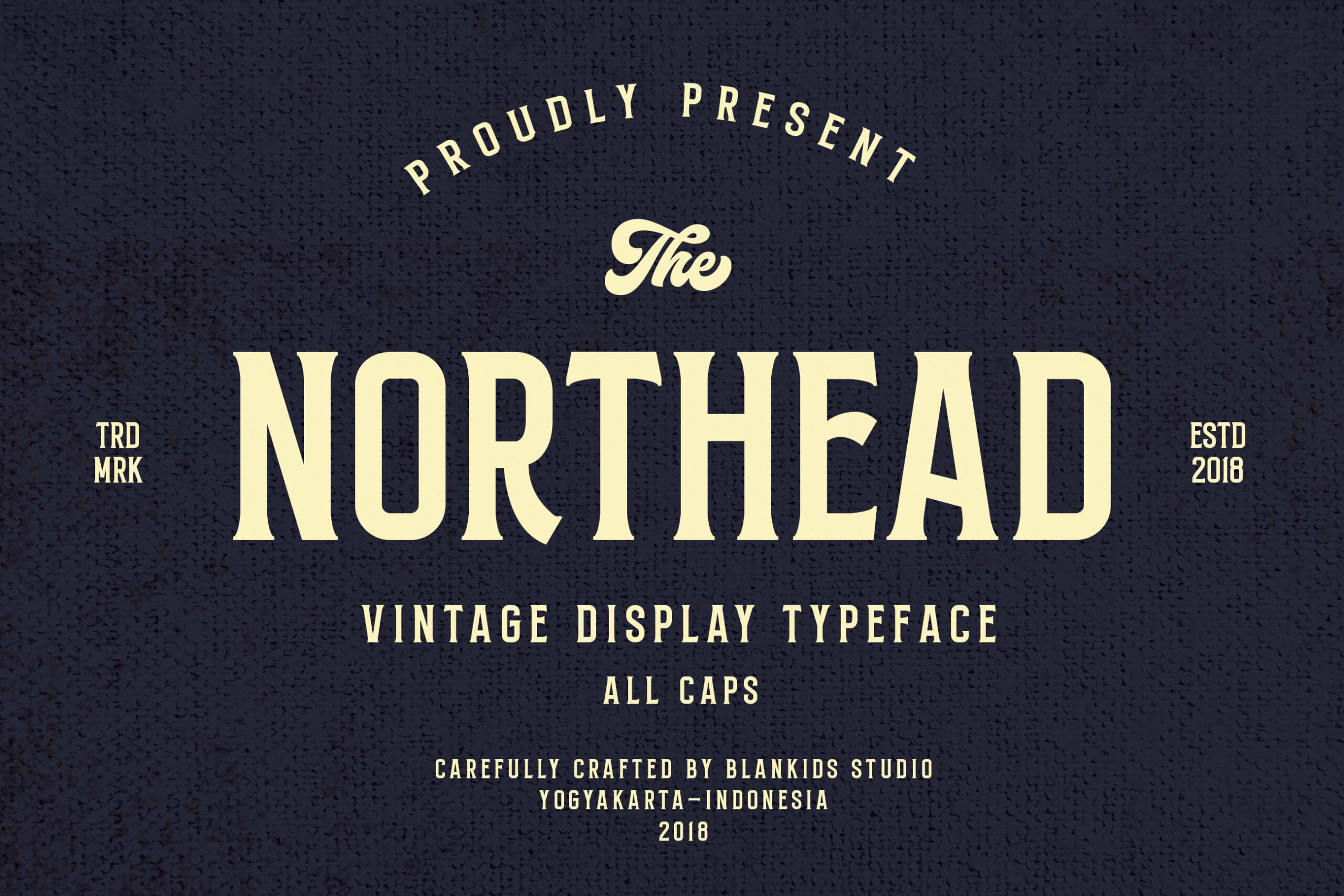 Northhead vintage display typeface in all caps with cream lettering on dark textured background