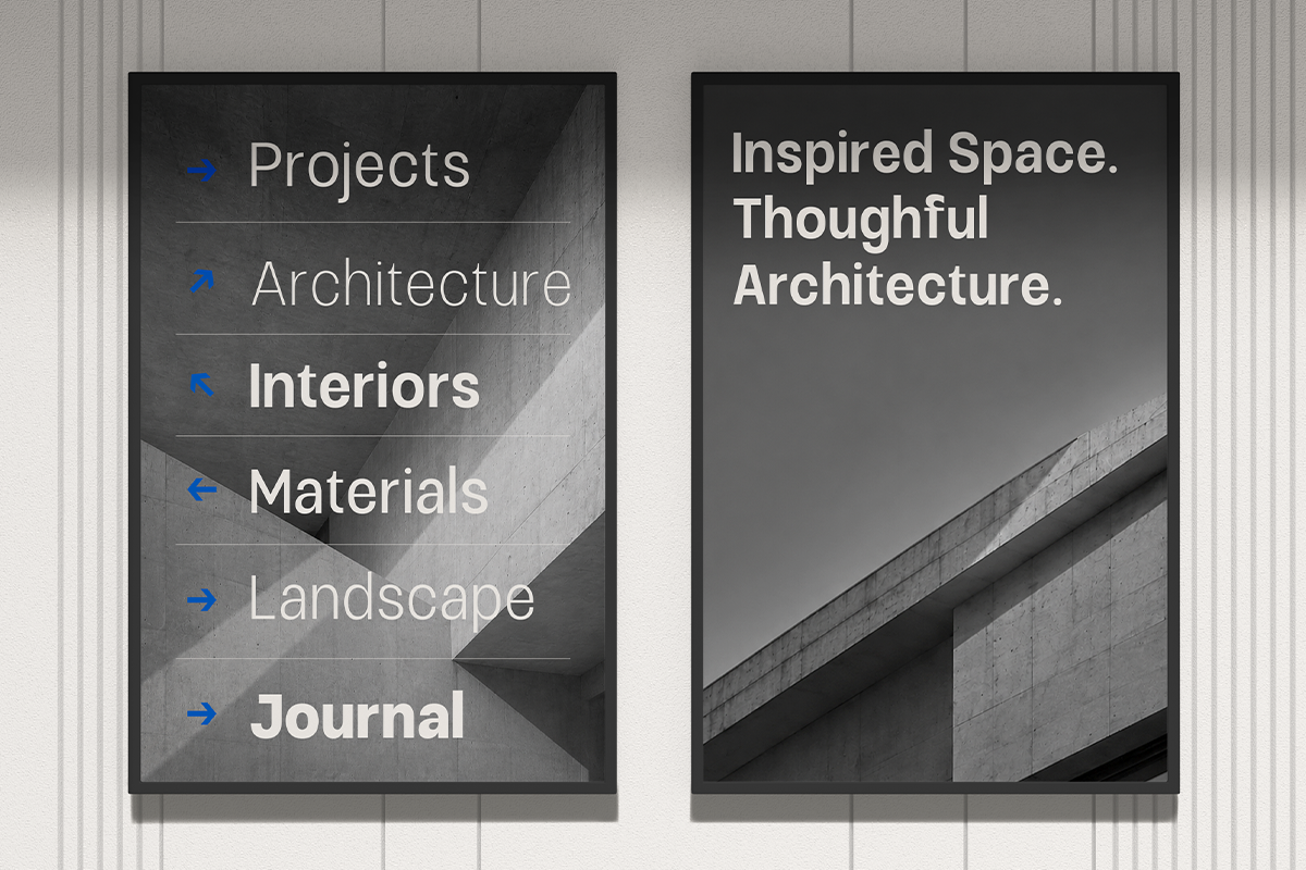 Two dark framed posters on concrete wall, left shows navigation menu with blue arrows, right displays bold typography over architectural detail