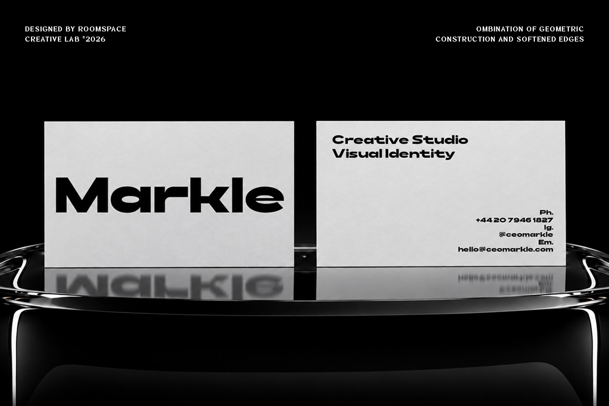 Minimalist business cards for Markle studio with bold sans serif typography on light gray stock