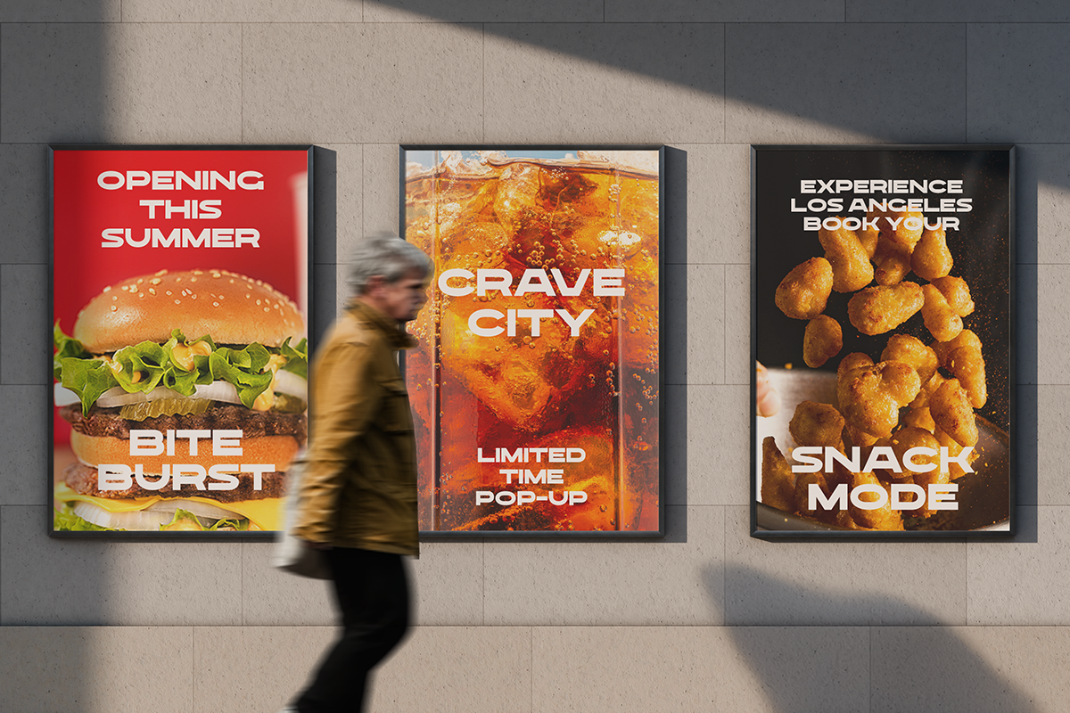Three food poster mockups on concrete wall with burger, cola drink, fried chicken designs