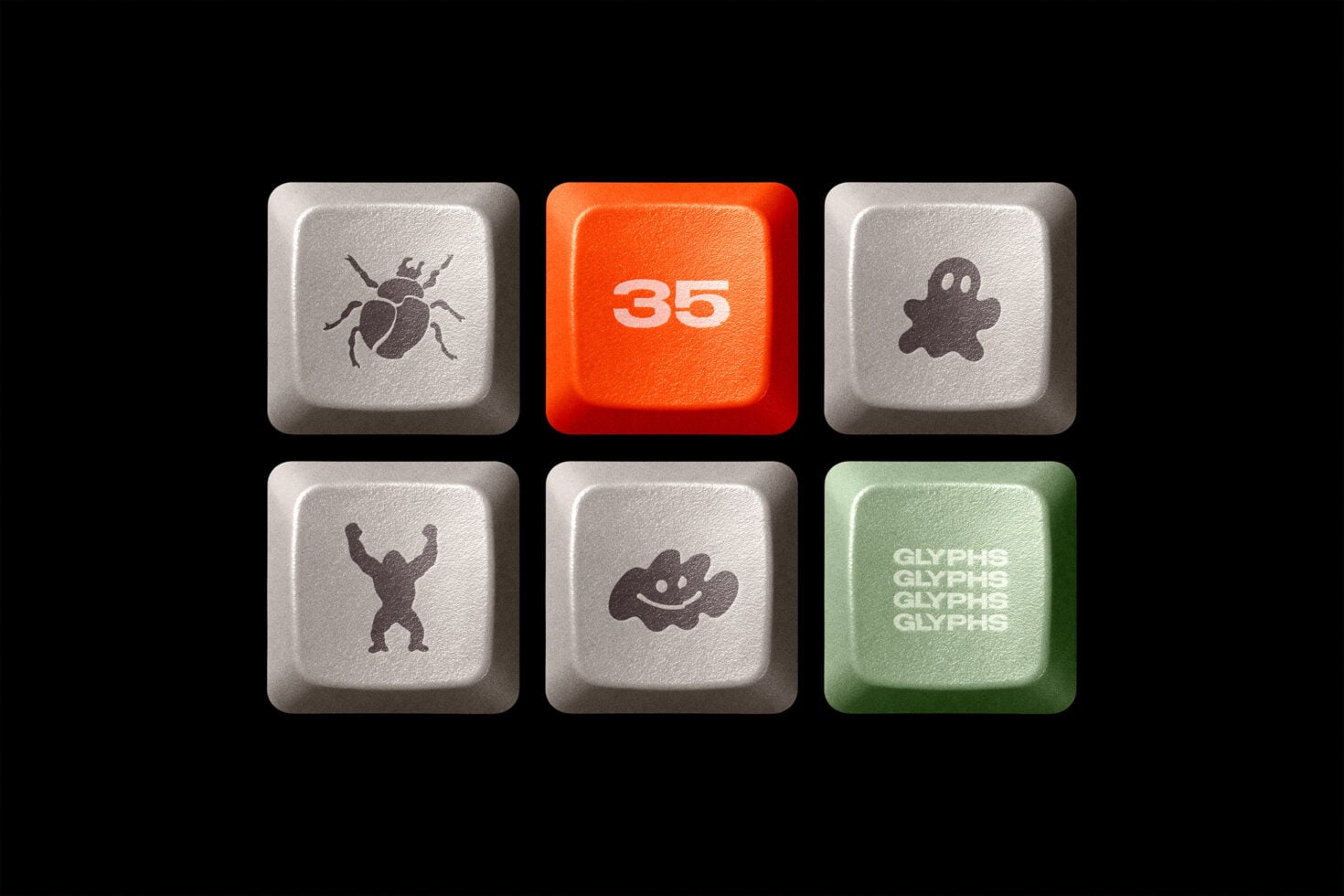 Keyboard keys mockup with spooky characters, bug icon, monster, ghost, number 35, glyph text on green key