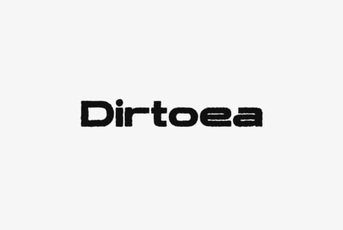 Dirtoea bold sans serif typeface with rough textured edges on light background