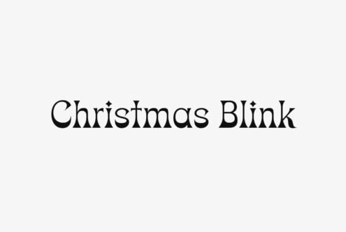 Christmas Blink serif font with decorative sparkle accents on light background