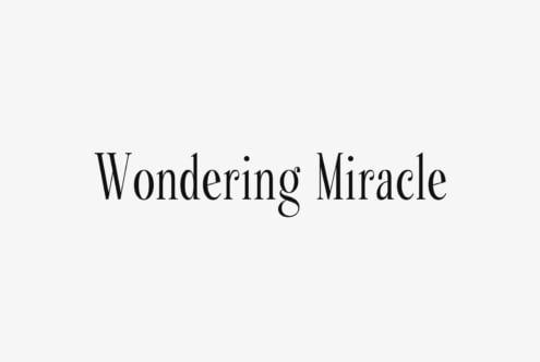 Wondering Miracle serif font displayed in black text on cream background