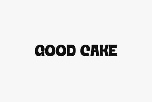 Bold black sans serif text reading "GOOD CAKE" centered on light gray background