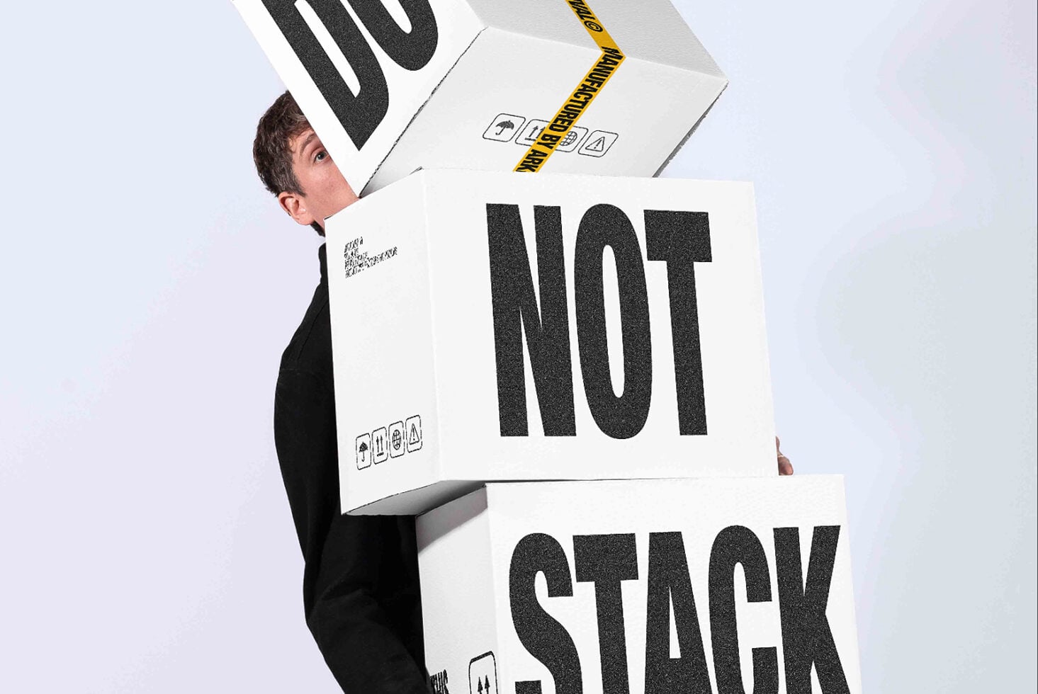Out of stock box mockup with yellow caution tape, tilted angle view