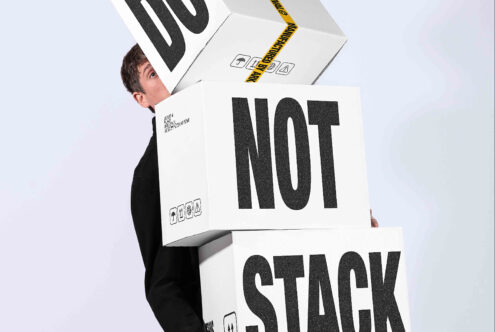 Out of stock box mockup with yellow caution tape, tilted angle view