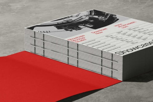 Stacked magazines mockup with red carpet, black interior photo, typography on cover