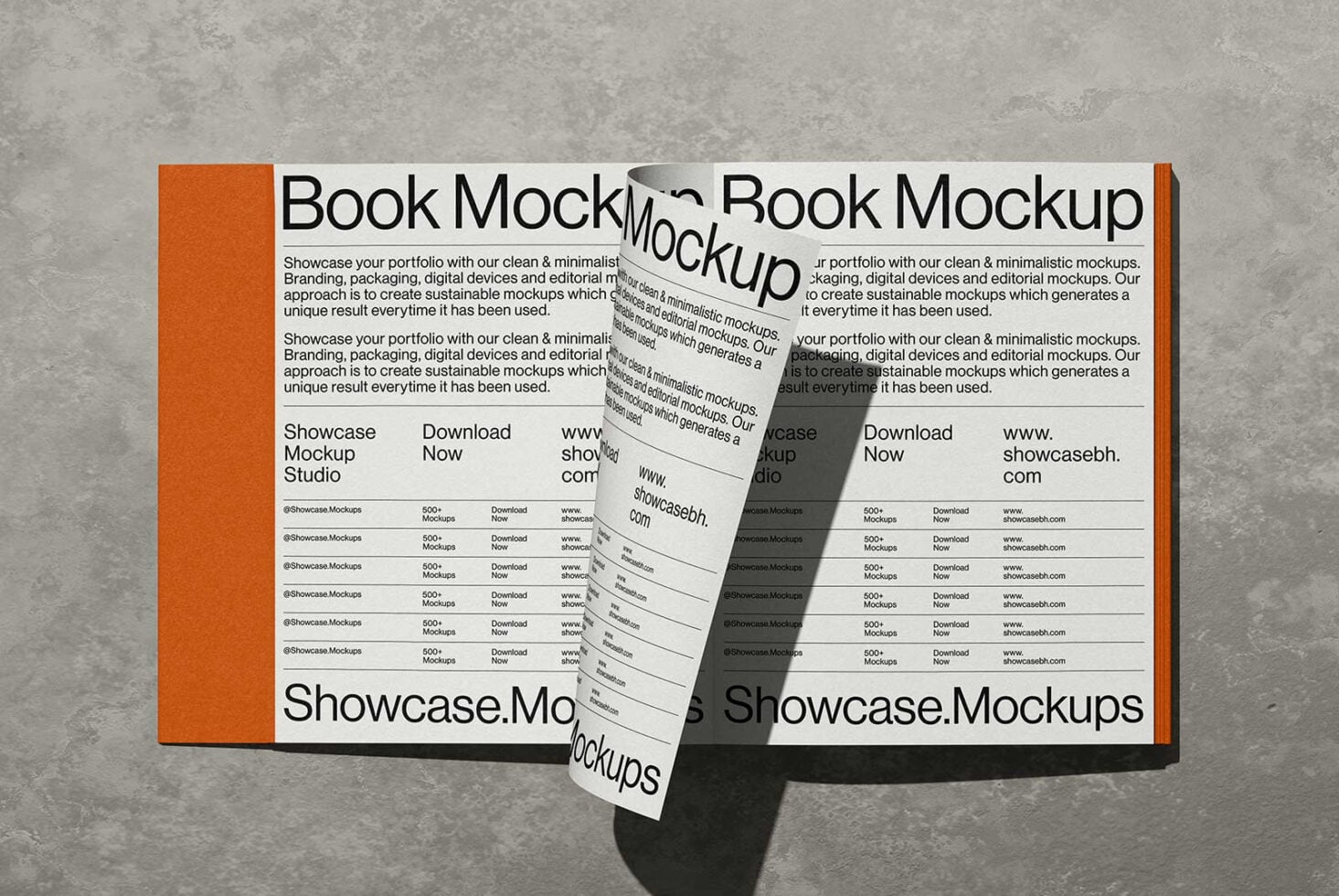 Open book mockup with orange spine showing minimalist design layouts on concrete background