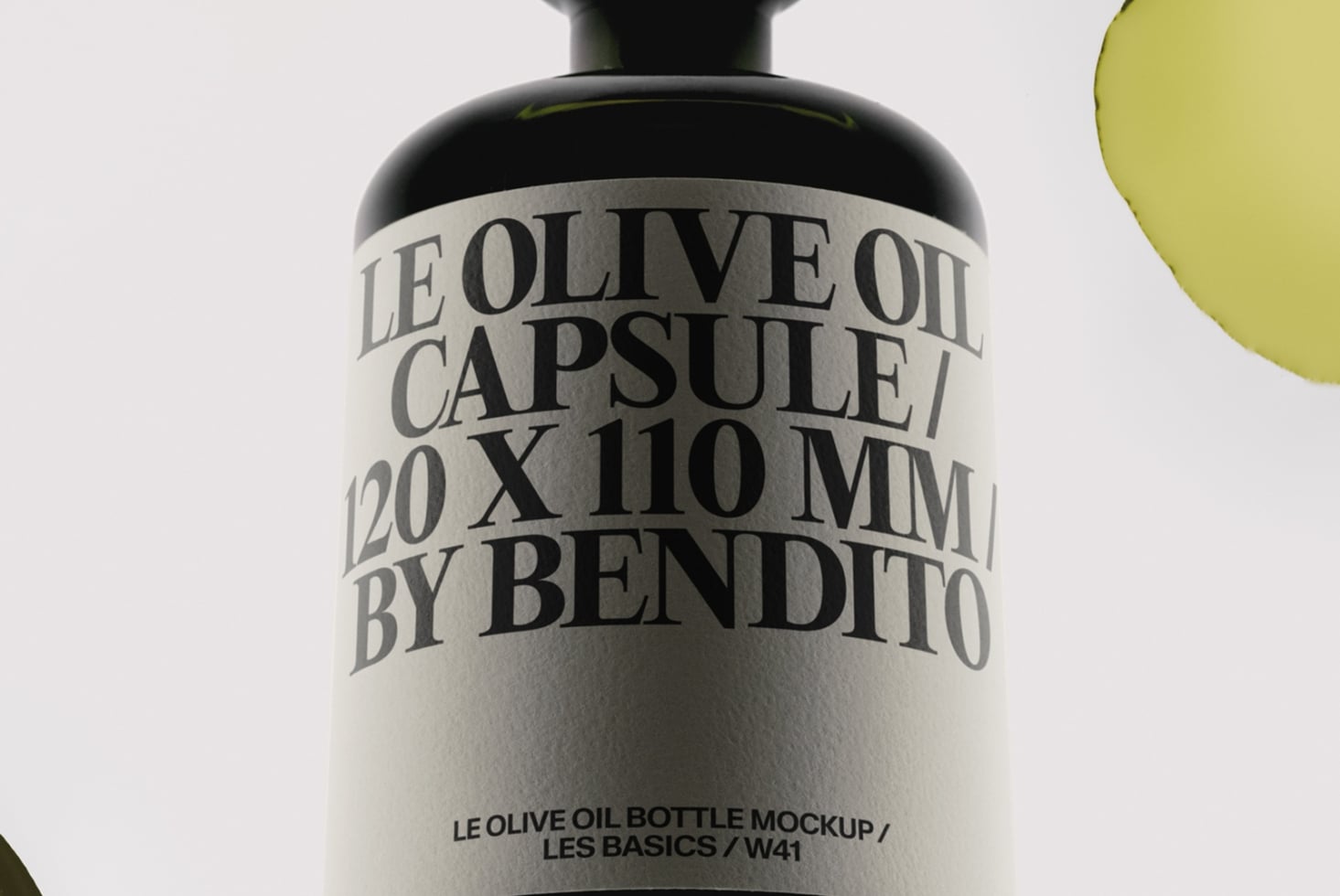 Closeup of olive oil bottle label showing serif typography, cream wrap label with black text on dark glass bottle