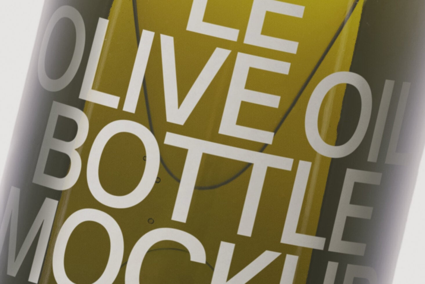 Close-up of mustard yellow book spine with bold white sans-serif typography overlapping in layers