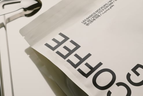 White box mockup with bold black typography showing product details, angled view with shadows