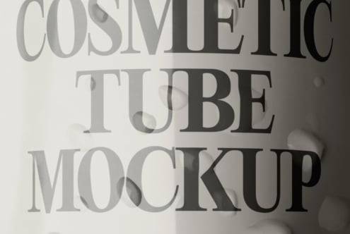 Cosmetic tube mockup with elegant serif typography showing product packaging design