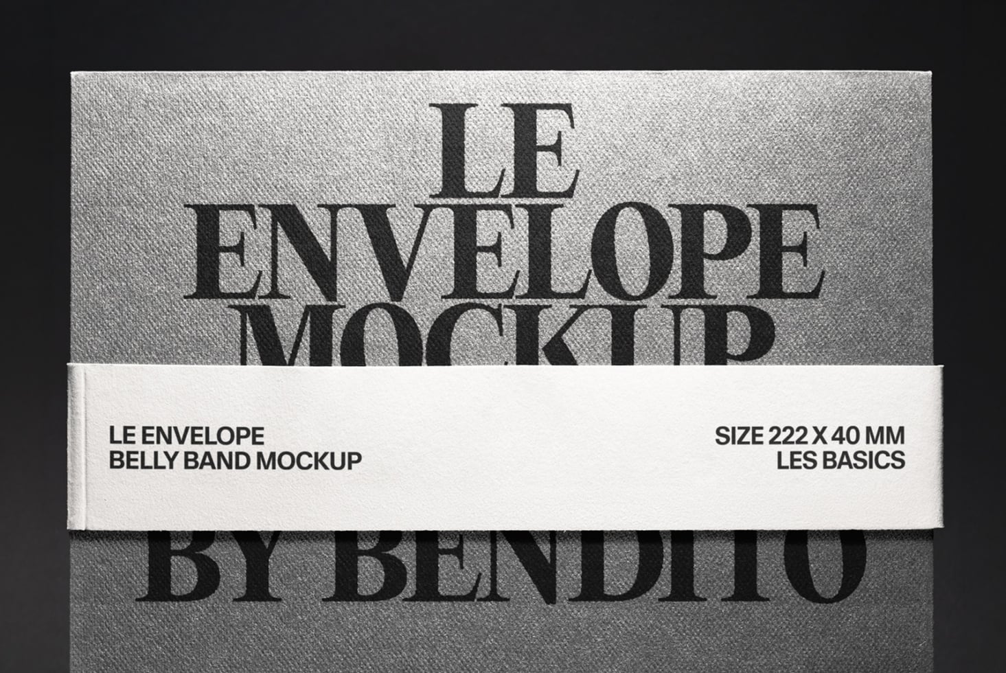 Le Envelope belly band mockup with white label strip on textured gray background