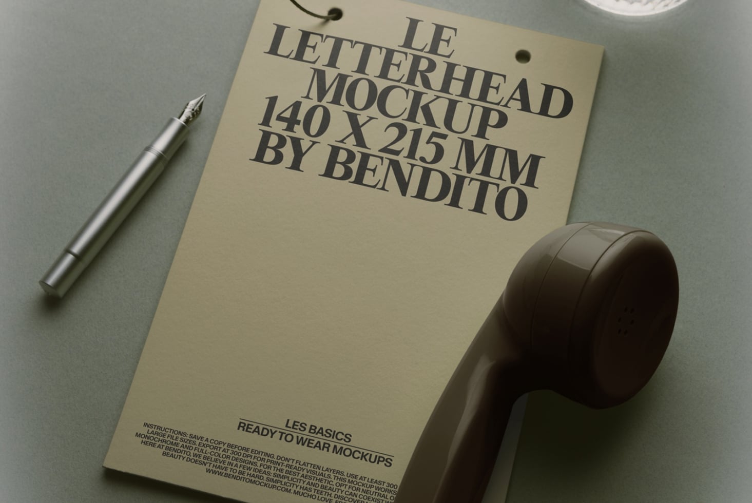 Cream letterhead mockup with fountain pen, wax seal, styled flat lay on gray surface