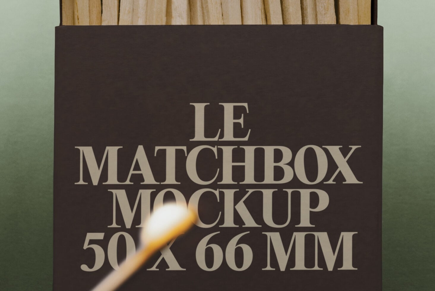 Matchbox mockup with cream serif type on dark brown box, lit match overhead, wooden surface background