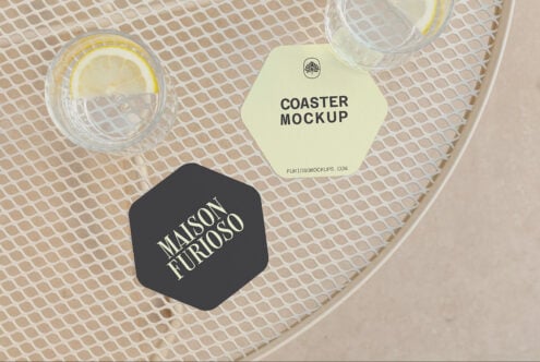 Hexagon coasters with lemon water glasses on cream mesh, showing cream plus black label designs