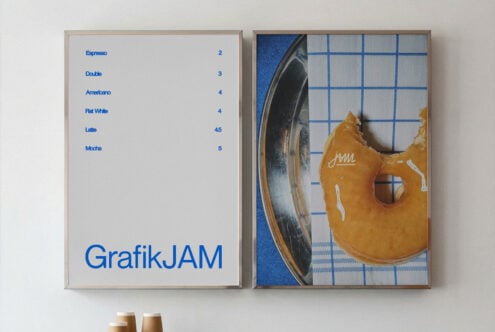 Two framed posters showing coffee menu on left, golden guitar with blue grid on right