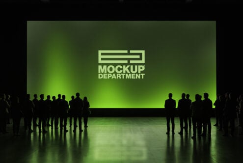 Silhouettes of people standing in front of glowing green screen with Mockup Department logo