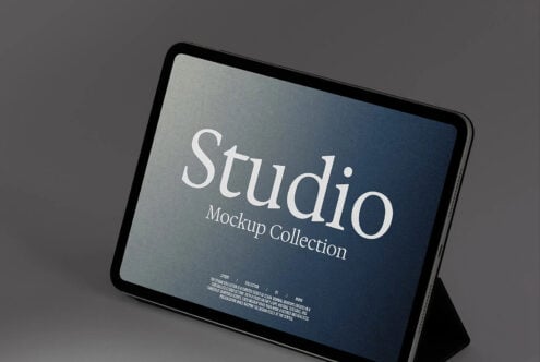 Tablet mockup with blue gradient background displaying Studio branding in elegant serif type