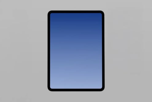 Tablet mockup with black frame on gray background, blue screen ready for designs
